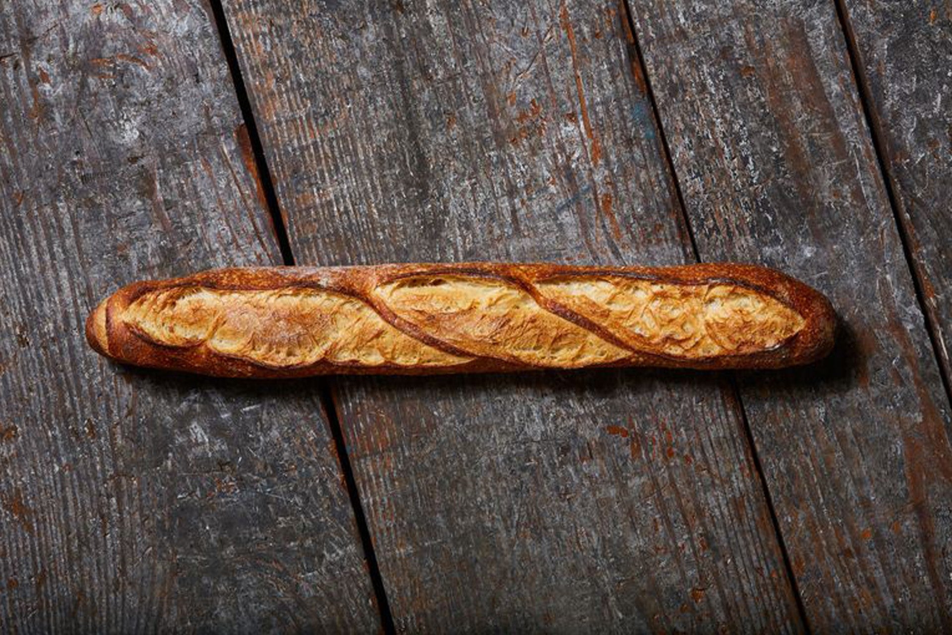 Klosterman Non Sliced French Artisan Baguette 12 Count Packs - 1 Per Case.