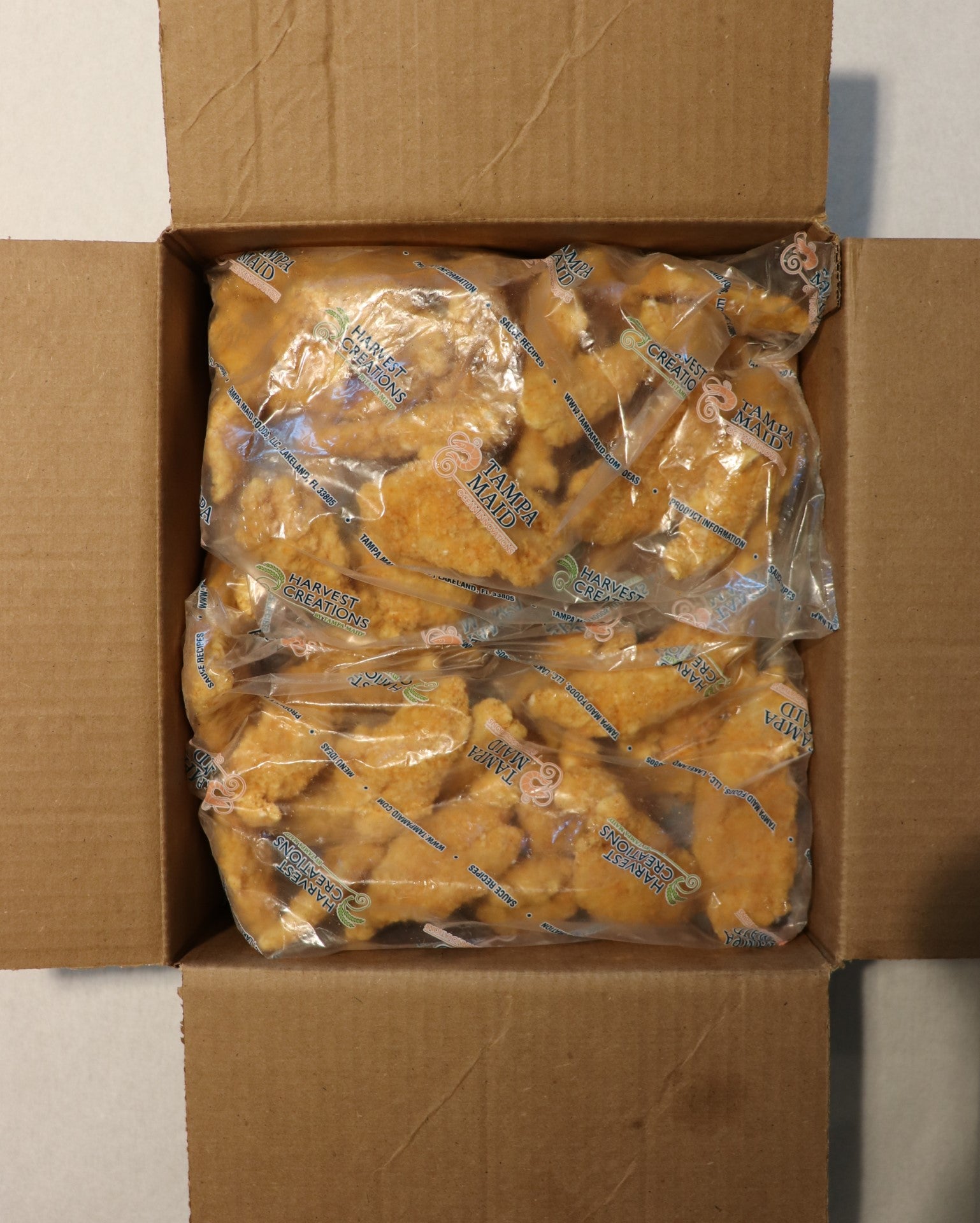 Tampa Maid Dipt'n Dusted Breaded Grouper Tenders 2 Pound Each - 6 Per Case.