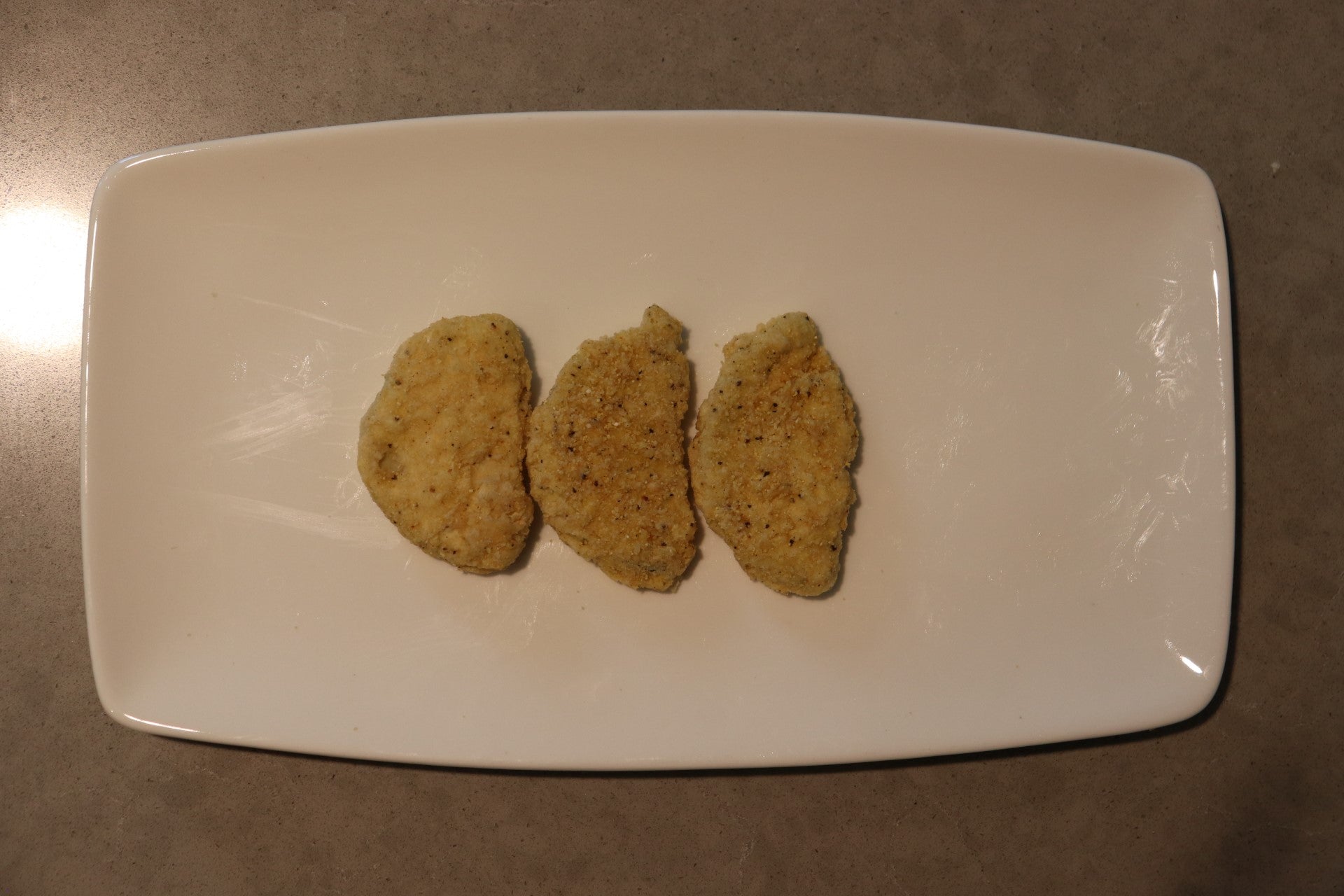 Harvest Creations Dipt'n Dusted Fried Green Tomato Halves 2 Pound Each - 6 Per Case.