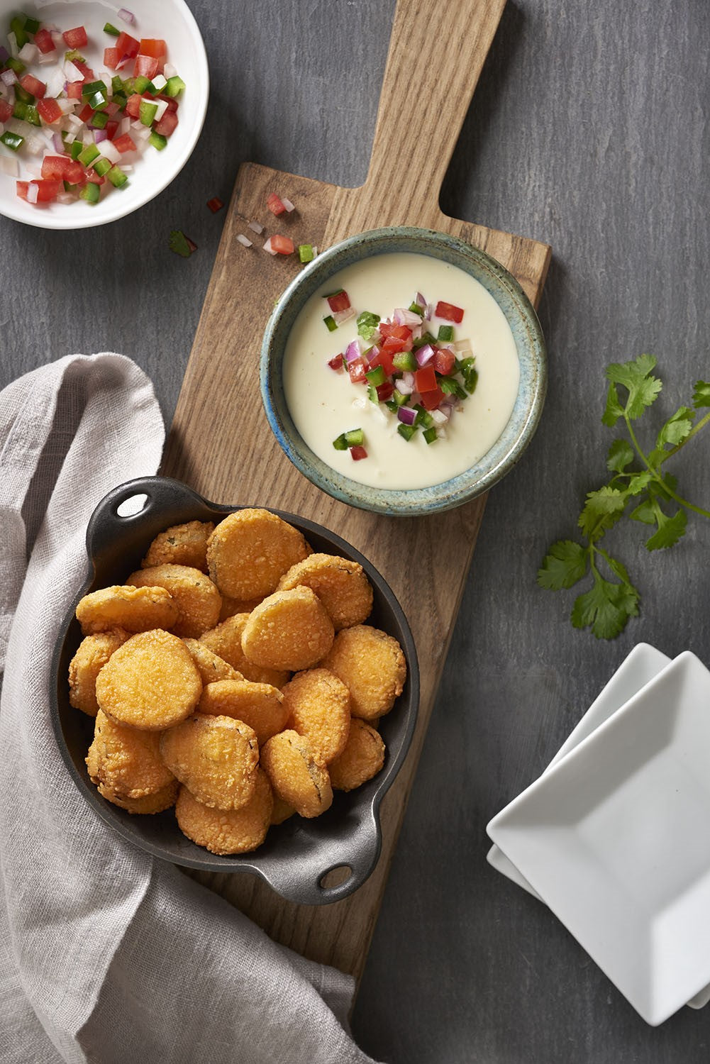 Harvest Creations Breaded Pickle Chips Spiced With Tabasco® Sauce 2.5 Pound Each - 4 Per Case.