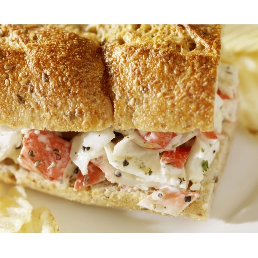 Frozen Seafood Packer Crabmeat Imitation Flake 2.5 Pound Each - 12 Per Case.