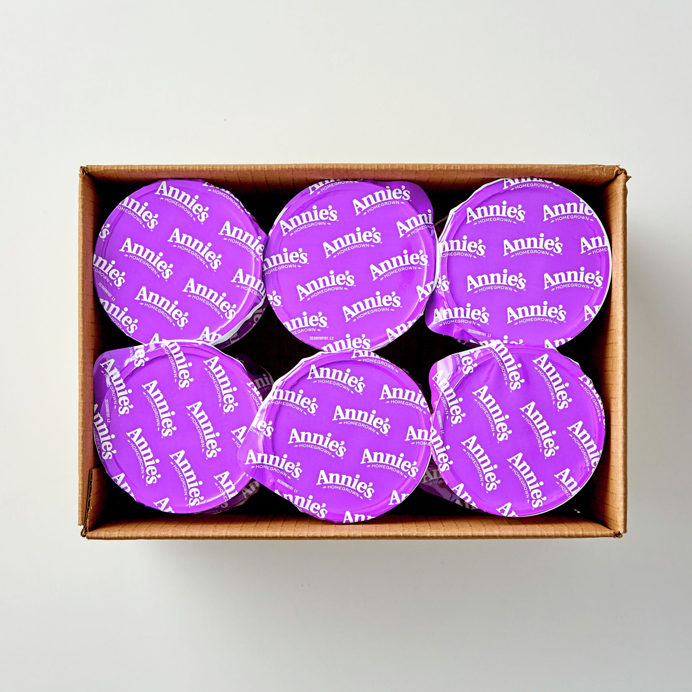 Annie's™ Macaroni & Cheese Microwave Single Serve Cup White Cheddar 2.01 Ounce Size - 12 Per Case.