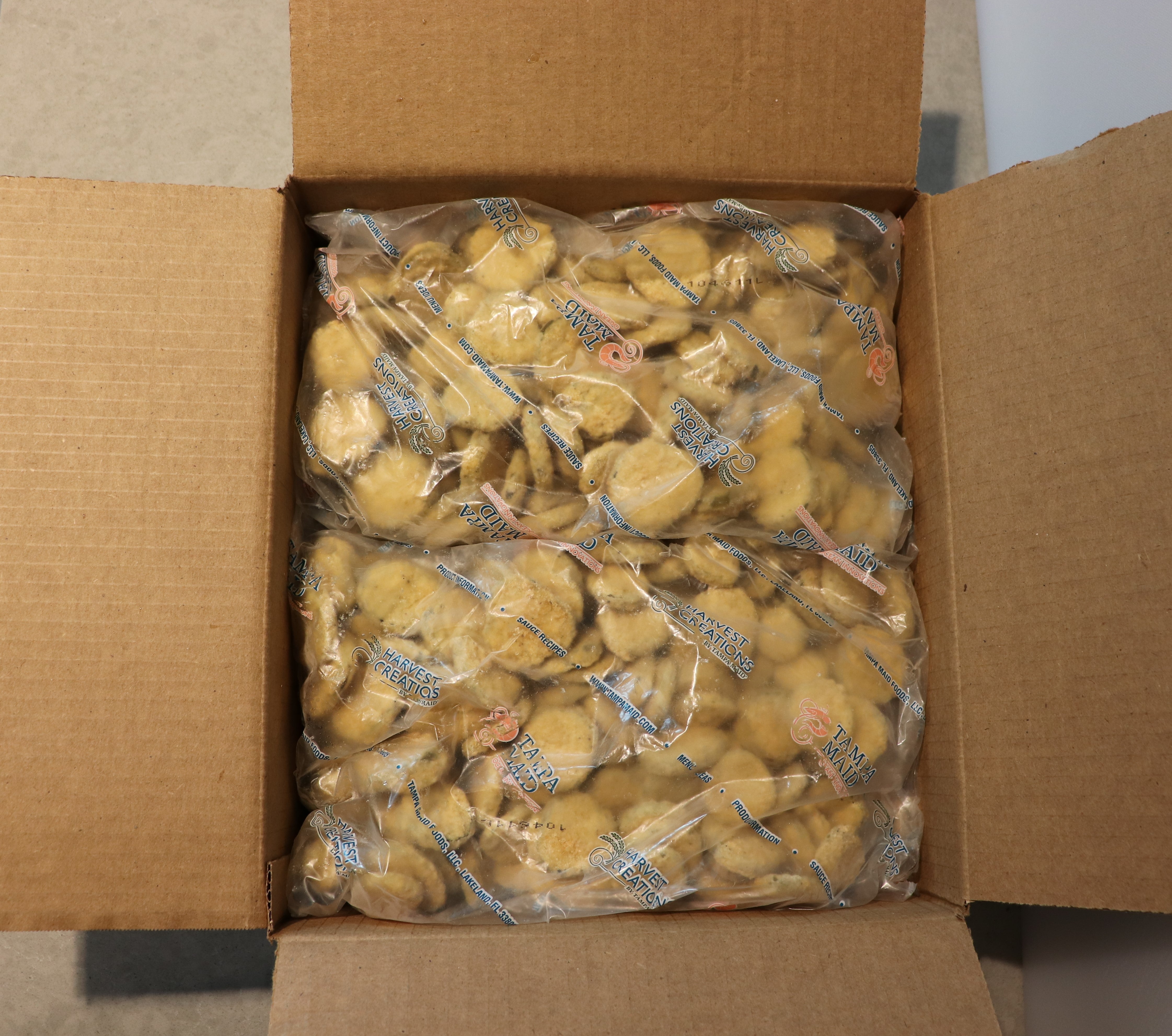 Harvest Creations Dipt'n Dusted Dill Fresh Pickle Chips 2.5 Pound Each - 4 Per Case.