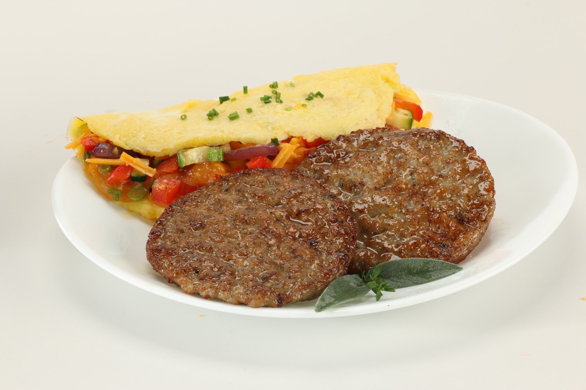 Jones Dairy Farm Pork Sausage Patties Mild Fully Cooked Gluten Free 2 Ounce Size - 1 Per Case.