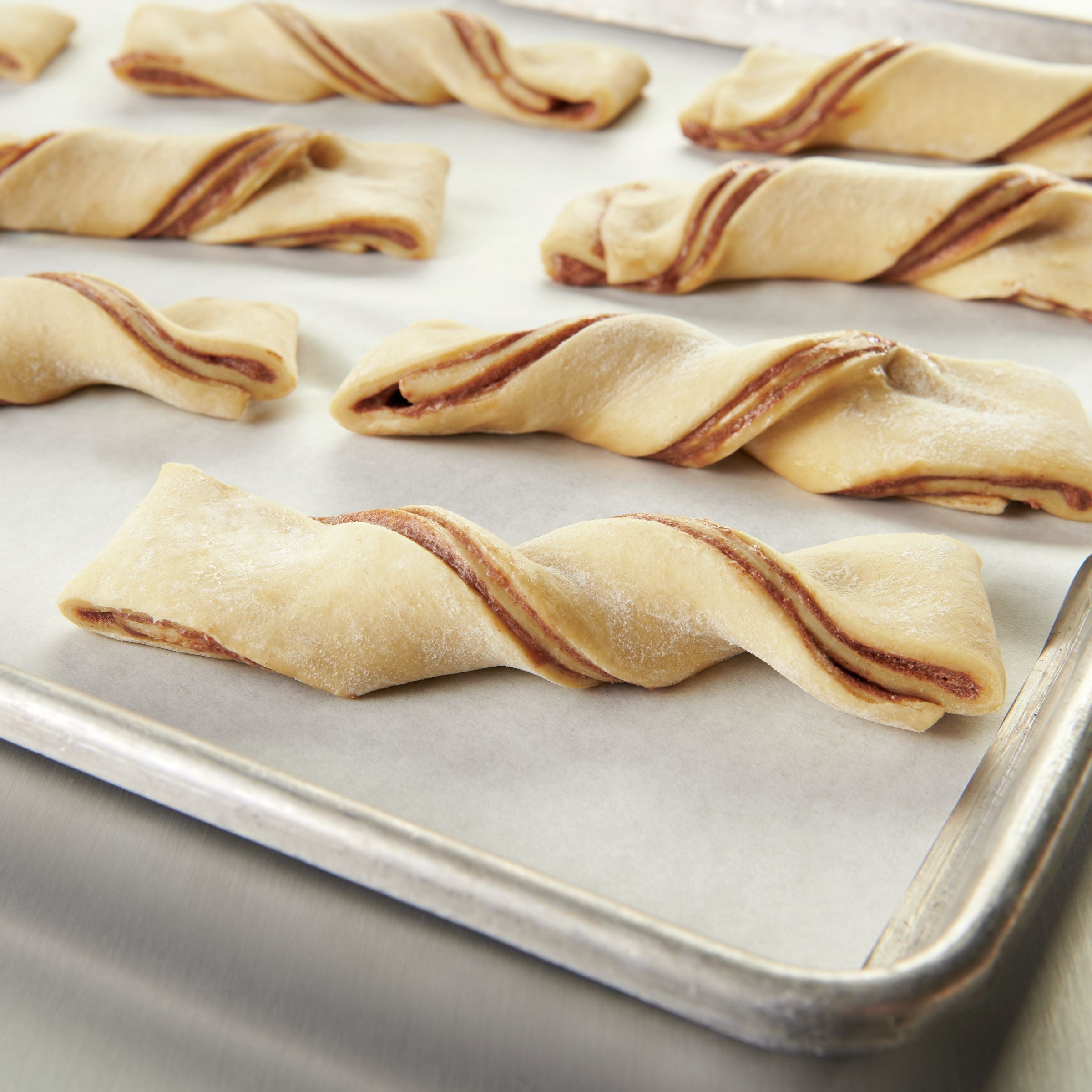 Pillsbury™ Place & Bake™ Frozen Cinnamon Roll Twist Dough Cinnamon 13.81 Pound Each - 1 Per Case.