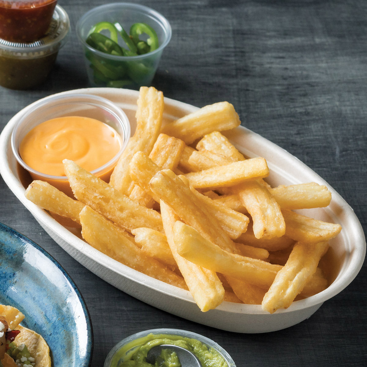 Simplot Conquest Delivery 8"x4" Clear Coated Tin Roof Fries 5 Pound Each - 6 Per Case.