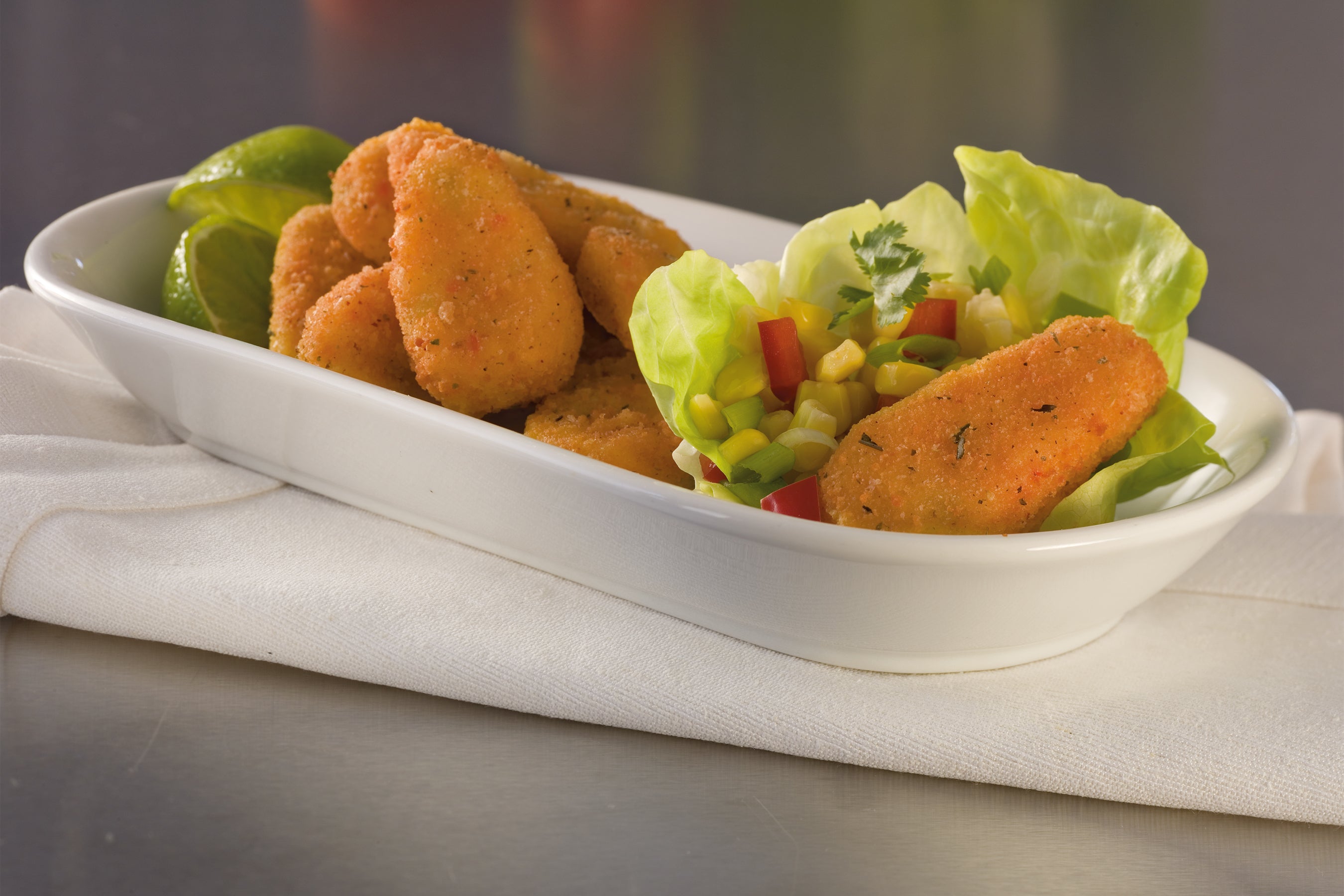 Jal Slice Xtremers Breaded Seafood & Crab Cheesebites With Jalapeno Peppers 10 Pound Each - 1 Per Case.