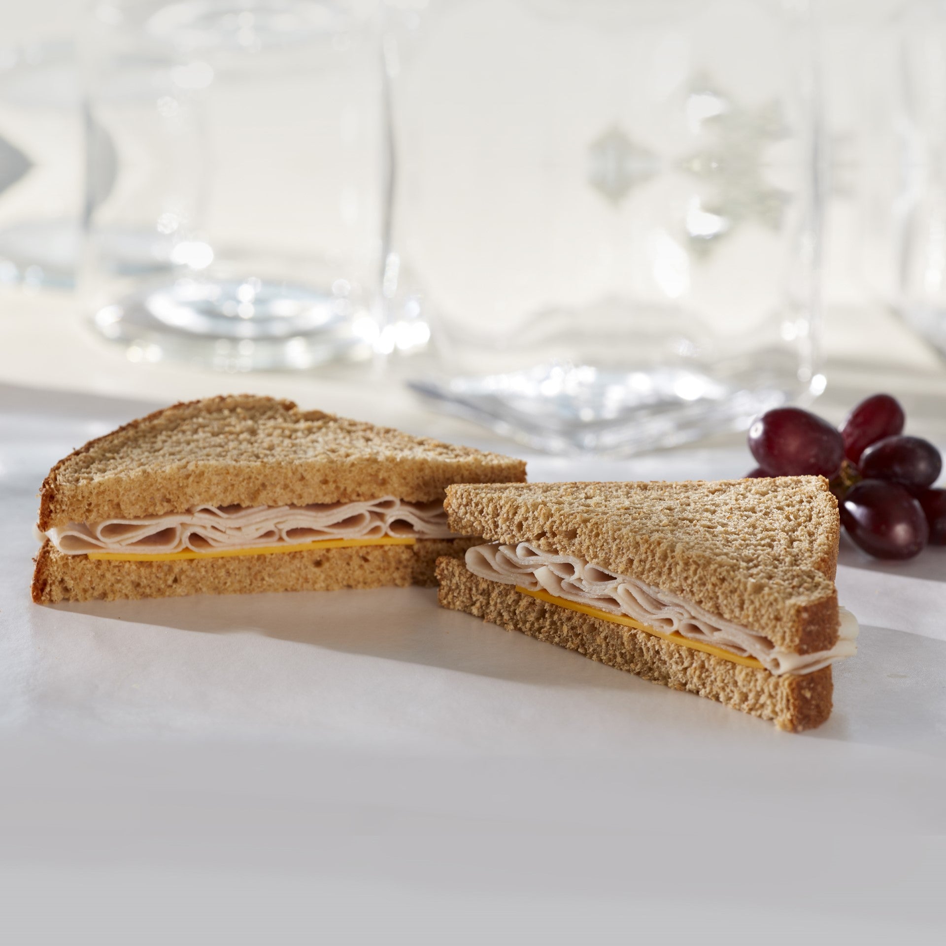 Market Sandwich Oven Roasted Turkey & Cheese Stoned Ground Wheat Bread Sandwich Wedge 5 Ounce Size - 10 Per Case.