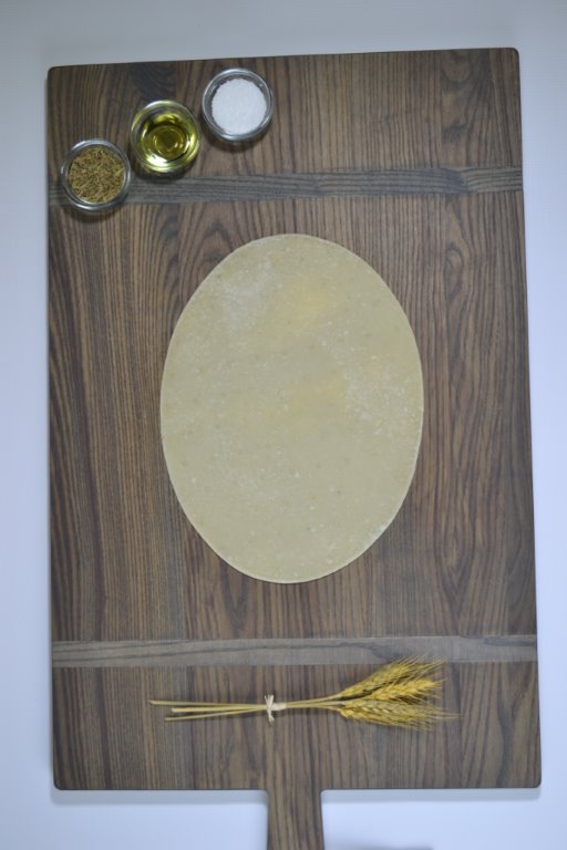Ultra Thin Pizza Shells 11 Inch Par-Baked Oval Flatbread Crust 3.5 Ounce Size - 50 Per Case.