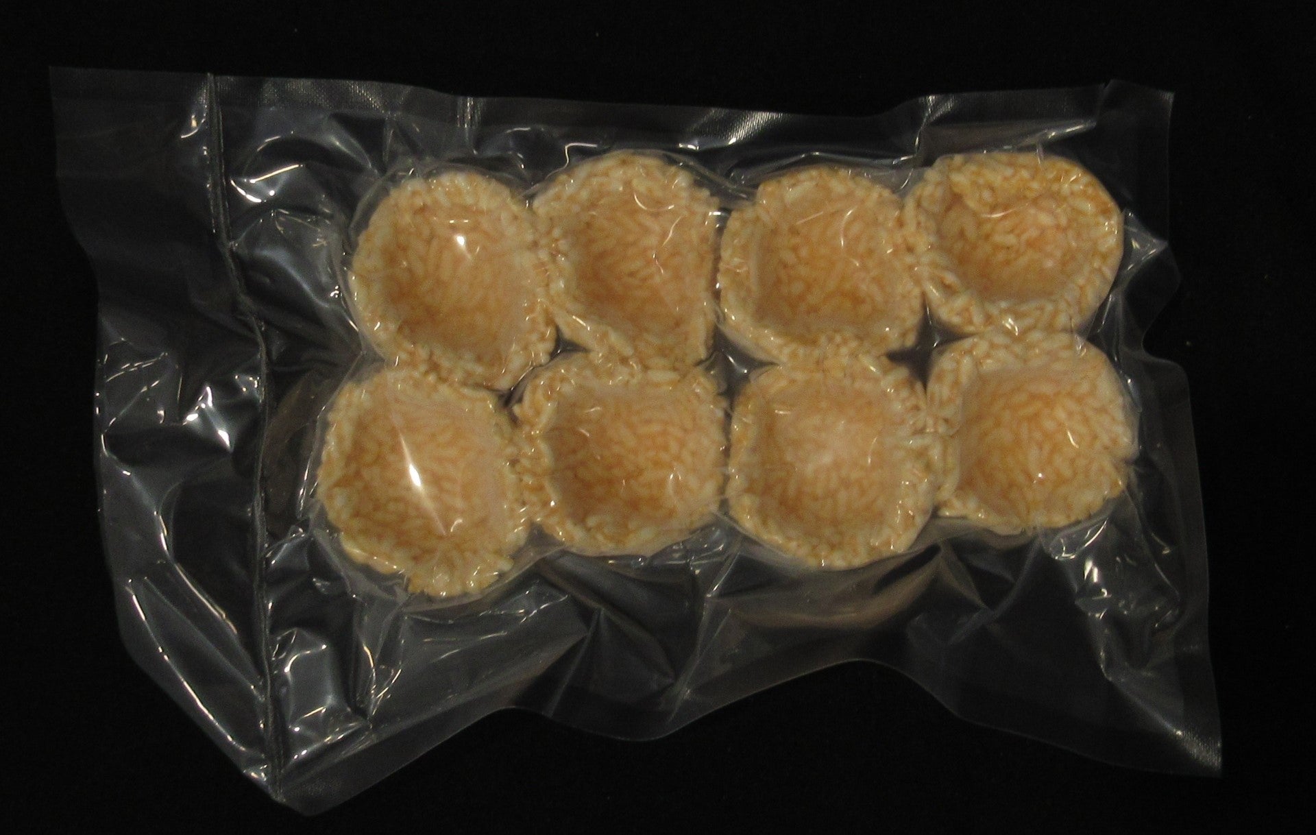 Ricewrap Sriracha Sushi Rice Cups 0.75 Ounce Size - 96 Per Case.