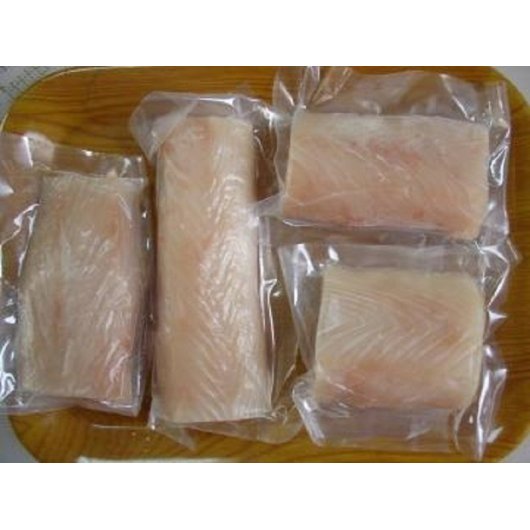 Frozen Seafood Commodity 4 Ounce Skinless Boneless Individually Packed Mahi Mahi Steak 10 Pound Each - 1 Per Case.