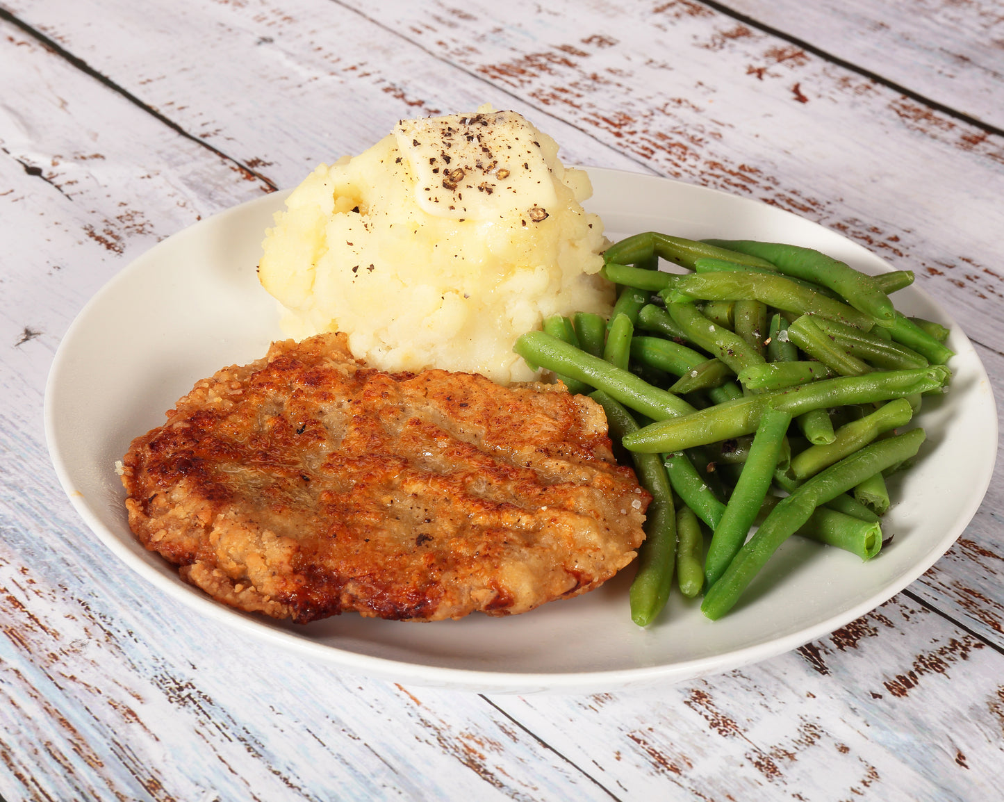 Pork Boneless Loin Fritter Breaded 4 Ounce Size - 40 Per Case.