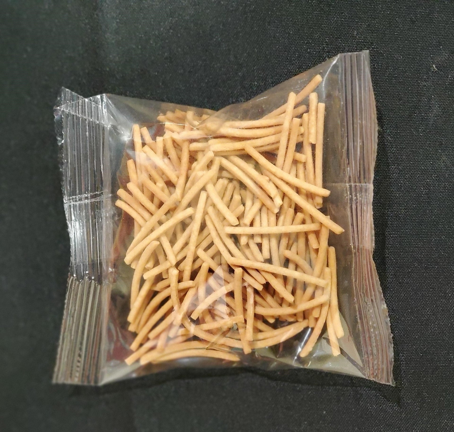 Green Dragon Whole Grain Crispy Chow Mein Noodles Individually Wrapped 0.8 Ounce Size - 140 Per Case.
