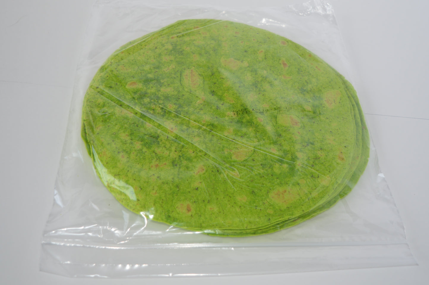 Mayan Spinach Tortilla 2" 3.104 Ounce Size - 12 Per Case.