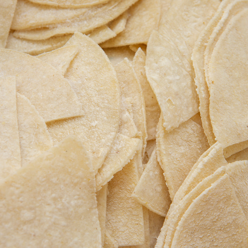 Maria & Ricardo's White Corn Tortilla Ready-To-Fry Chips 573 Each - 24 LB Per Case.