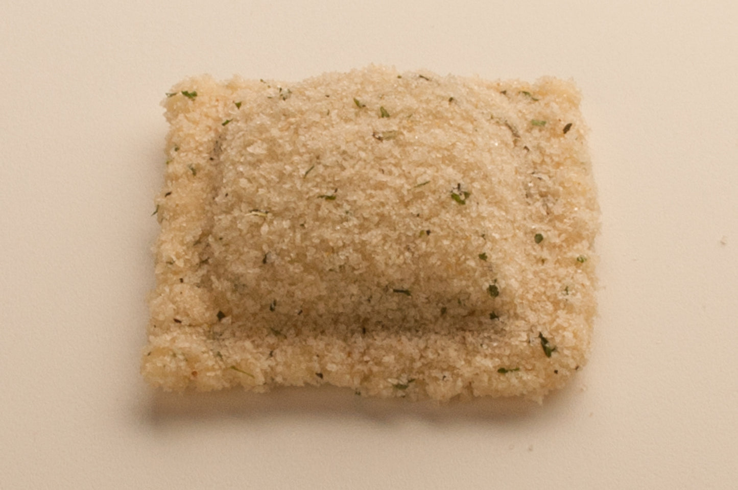 Louisa Foods Breaded Beef Ravioli 2" Square 5 Pound Each - 2 Per Case.